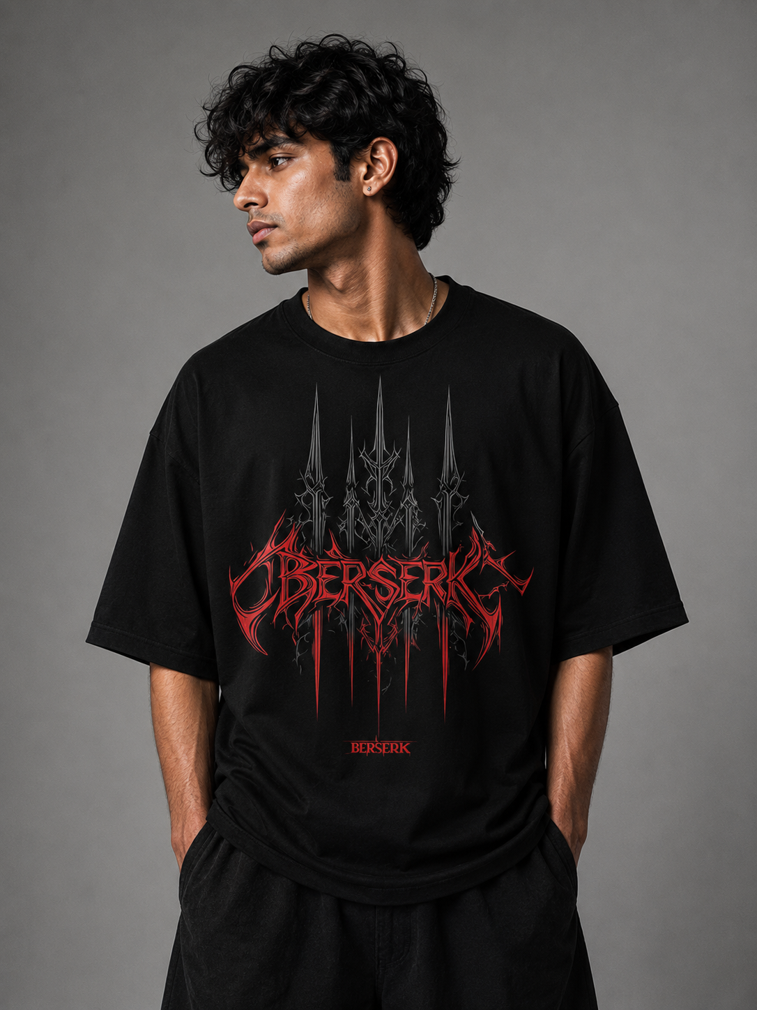 Berserk Oversized Graphic T-Shirt front view featuring bold red death-metal typography and iron spikes design by Flexu